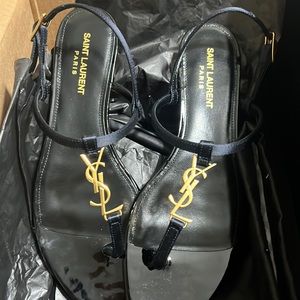 Brand new YSL cassandra flat sandals